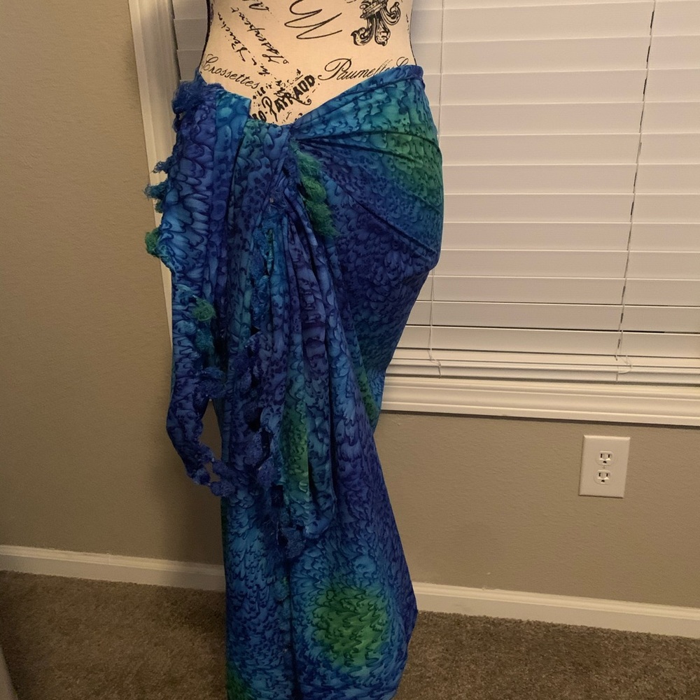 Wrap sarong in lots of shades of blue.